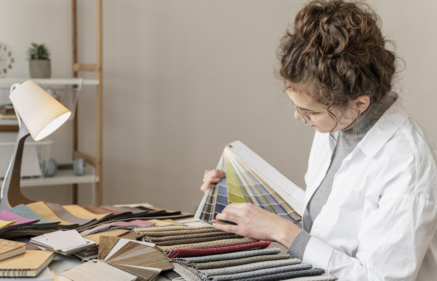 Interior designer working through fabric and colour swatches